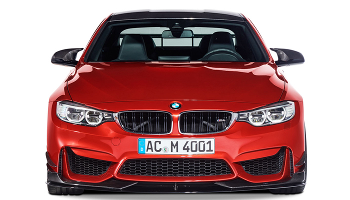 Die optionalen BMW Carbon Heckdiffusor- und Auspuffspitzen Mit tropfender  Autoseife auf EINEM BMW M4 F83 aus dem Jahr 2015 Cabriolet Stockfotografie  - Alamy